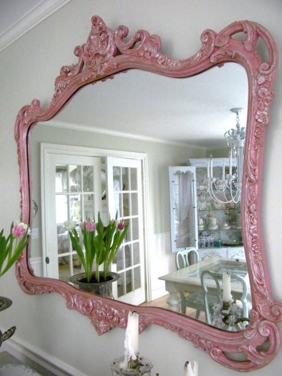 A giant vintage mirror to hang on a back wall or over the couch. Mirrors give small rooms the illusion that they are bigger. Plus, if I can find a bright frame like this, it will add some color to the bland white walls almost all apartments have. 
